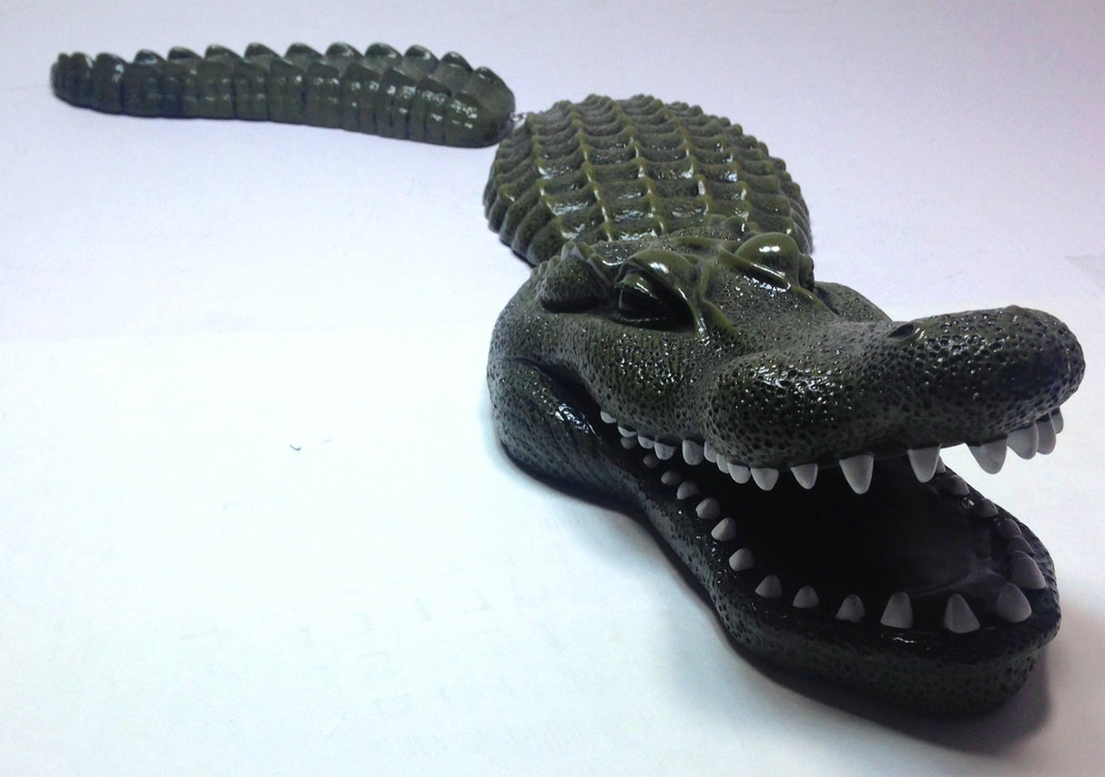 floating alligator decoy for heron control in koi ponds and water gardens