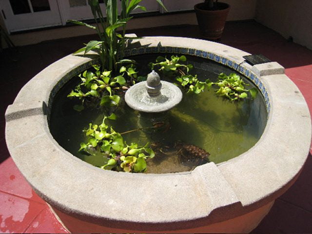 Tiled pond fountain lined with epoxy