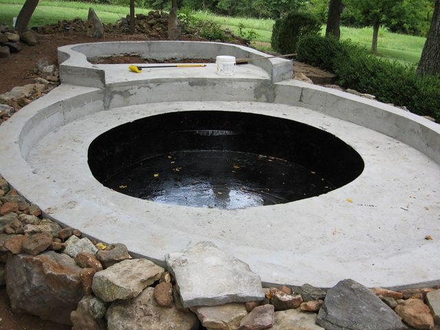 Two level pond lined with black epoxy